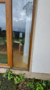 Broken window before glass repair